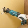 Scie Sabre 10.8 V Li-ion 4 Ah CXT MAKITA - JR103DSMJ 2 Scie Sabre 10.8 V Li-ion 4 Ah CXT MAKITA - JR103DSMJ -Maxoutil Soldes SDD40017 1